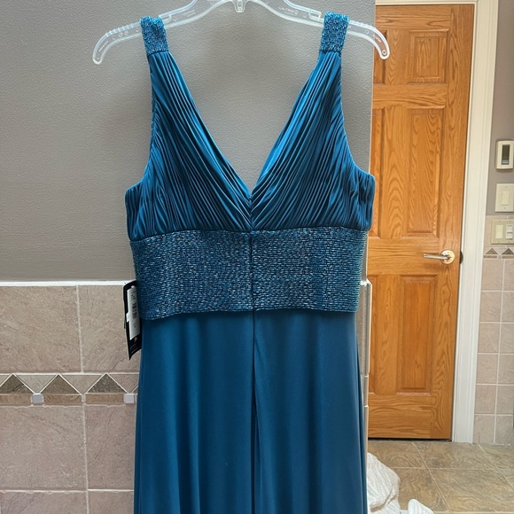 NWT deep turquoise blue formal beaded dress. Back zipper closure with hook. - Picture 4 of 7